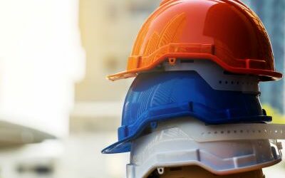 Colorful stacked construction helmets
