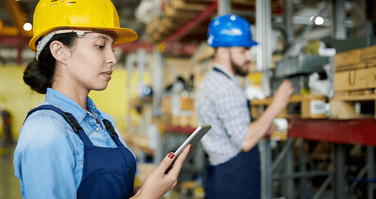 Woman reviewing data via her mobile phone.